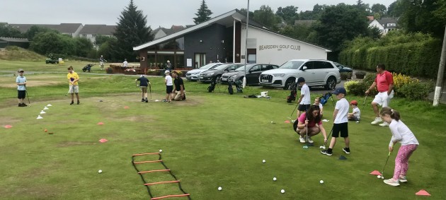 Juniors enjoying fun activities on the putting green.