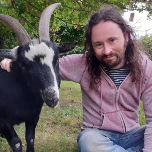 A goat and Gareth Morgan