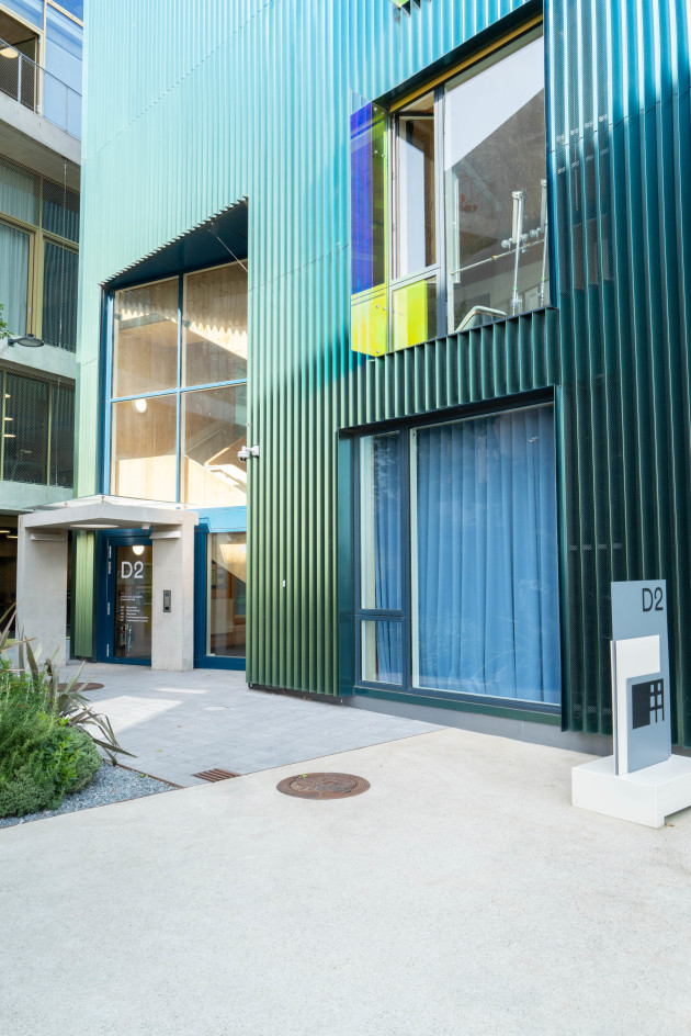 The Photography Foundation Building Entrance (Green cladding facade, glass windows)
